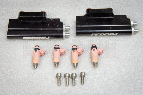 Perrin Fuel Rail (Incomplete) with pink injectors